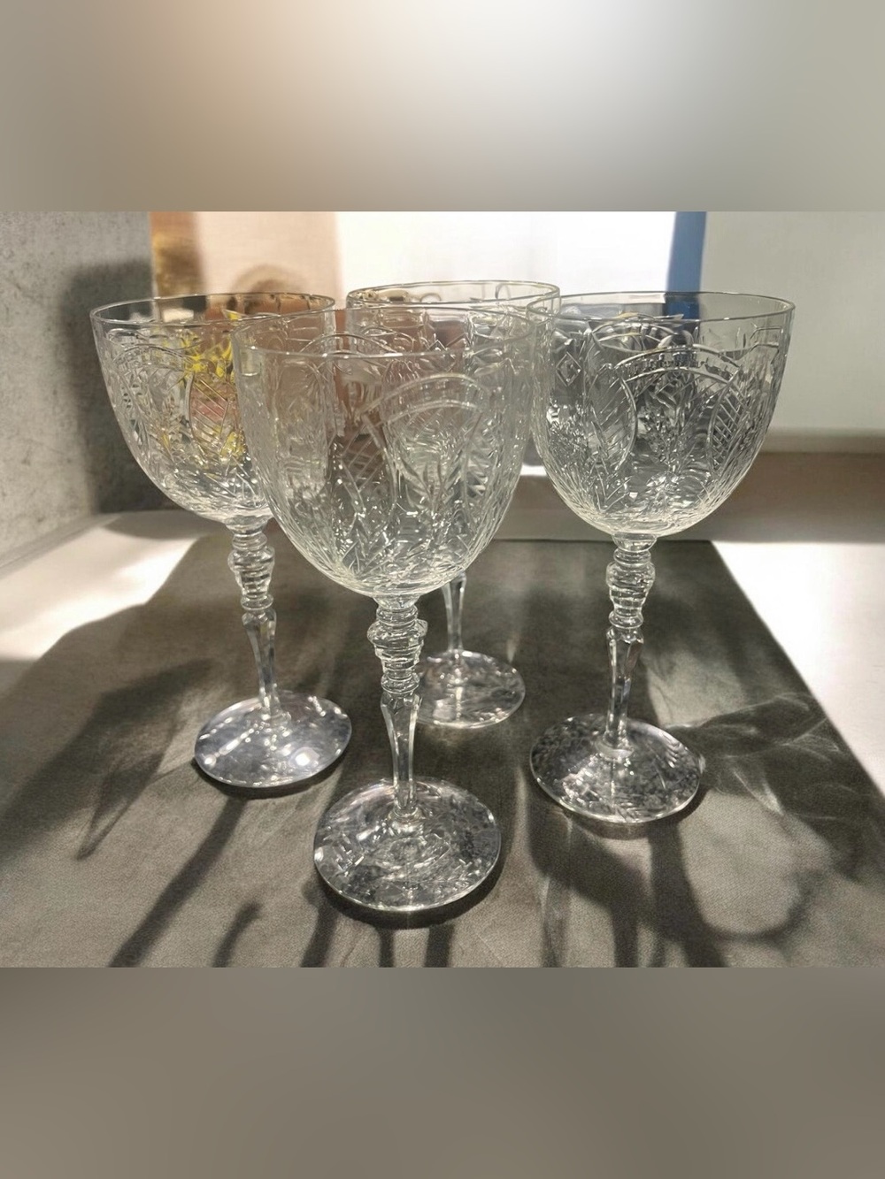A set of four vintage 1930 Rock Sharpe crystal wine glasses with paisley pattern